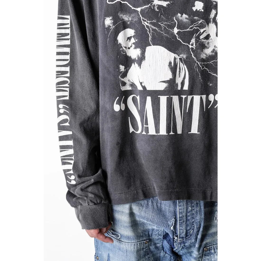 SAINT Mxxxxxx LS TEE/TEMPEST/BLK 'TEMPEST SAINT' Storm Religious Saints Cracked Retro Vulcanized Heavy Wash Long Sleeves Washed Black S-XL Assute Dyeing Multi-bit Horse Fading Craftsmanship Grinding and Hanging Holes Full of Old Feeling Top Printing Craftsmanship Purchasing Level